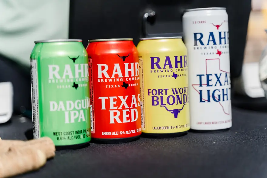 Cans of Texas beer from a local brewery partner